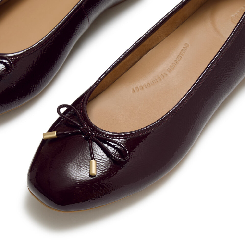 DELICATO BOW TEXTURED PATENT-LEATHER BALLET FLATS